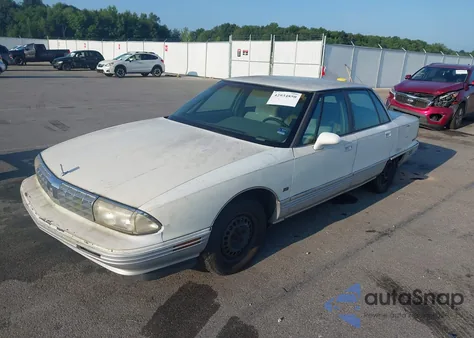 1992 Oldsmobile 98 Regency из США, поврежденный, VIN 1G3CX53L4N4310471